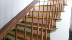 This interior stair railing that serves as guardrail and handrail.